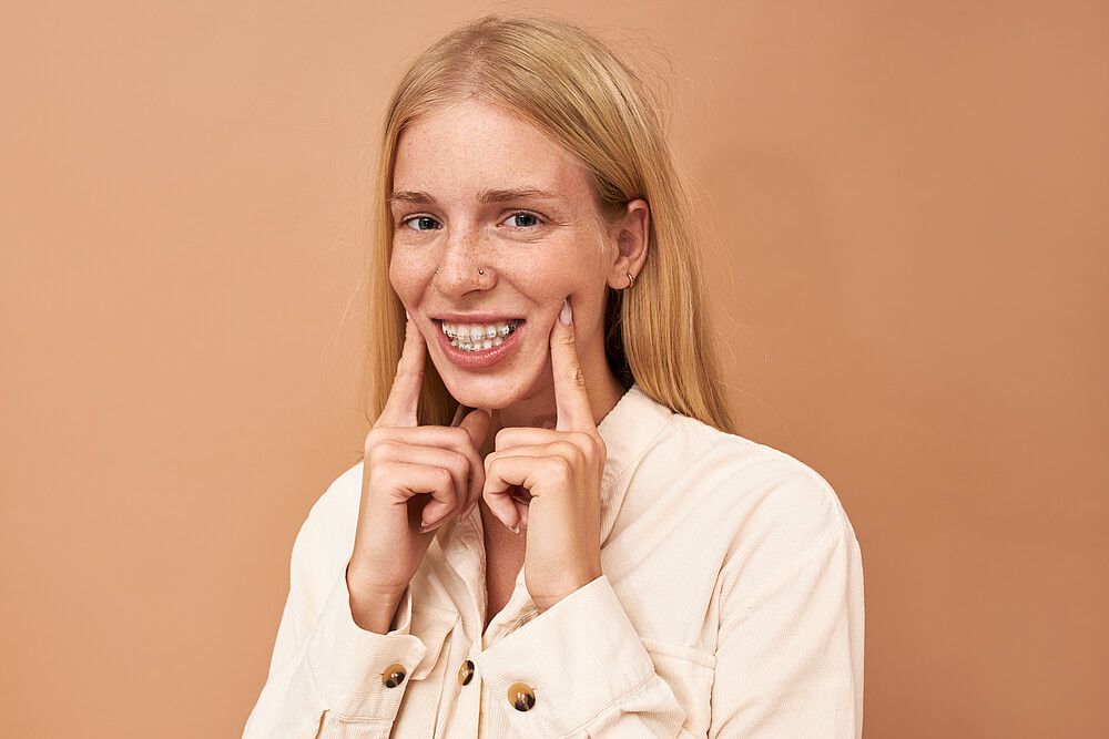 girl, studio, braces, young, woman, female, beauty, beautiful, background, teeth, model, face, white, mouth, person, pretty, adult, healthy, caucasian, attractive, portrait, isolated, happy, bracket, cute, hair, teenage, dental, dentistry, orthodontic, people, closeup, metal, posing, fresh, cheerful, fashion, expression, correction, dentist, care, treatment, overall, straight, hygiene, orthodontist, pain, painful, ache, frustrated